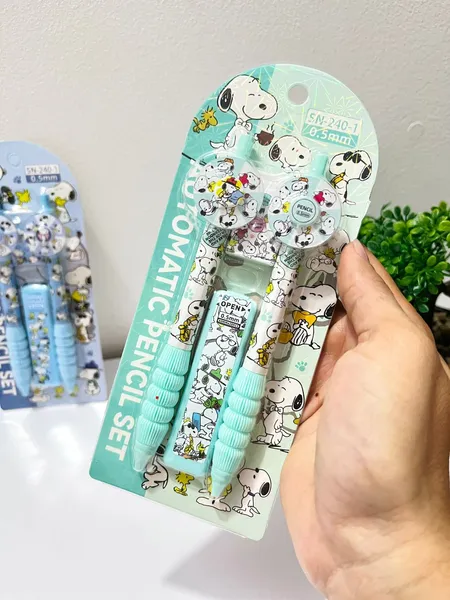 Set universitario Snoopy